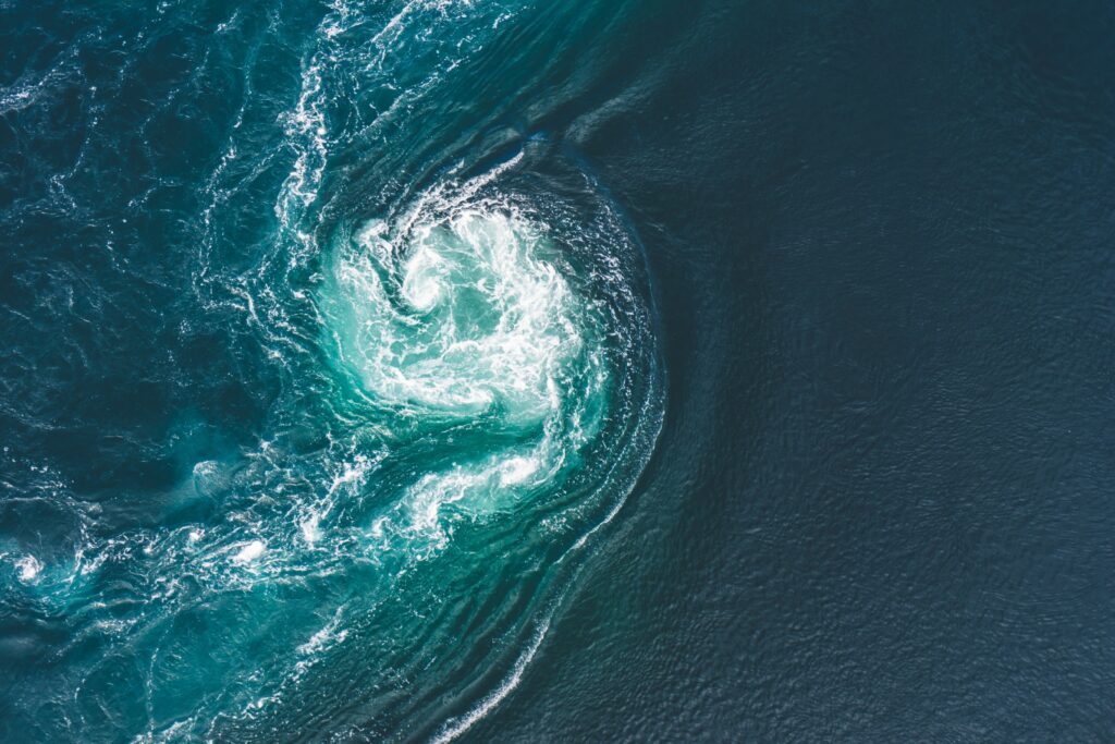 Whirlpools of the maelstrom of Saltstraumen, Nordland, Norway . Saltstraumen is a small strait with one of the strongest tidal currents in the world. B y Letowa.