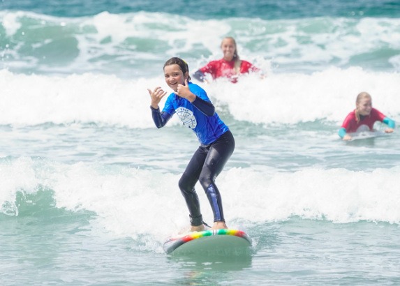 Boy learning how to surf