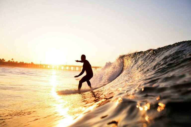 Man surfing on the a California beach